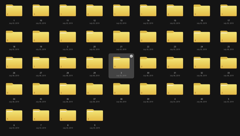 A file browser showing forty folders named 1 to 40, each holding between none and five photographs, all dated July 2019